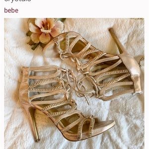 BEBE gold lace front heels with crystals